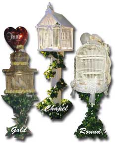 three styles of fancy cages that hold a pair of doves for display